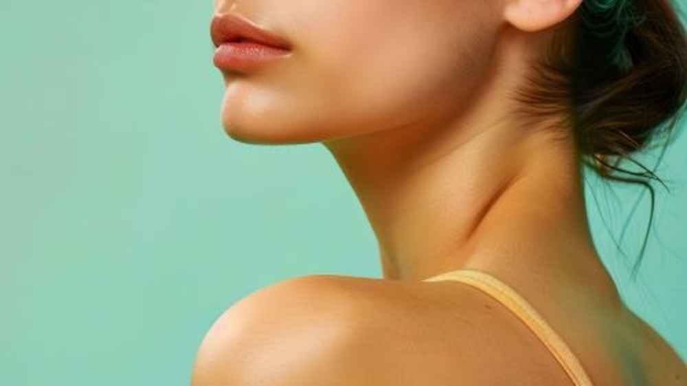 Close up of woman's chin and jawline after natural-looking facial balancing procedure