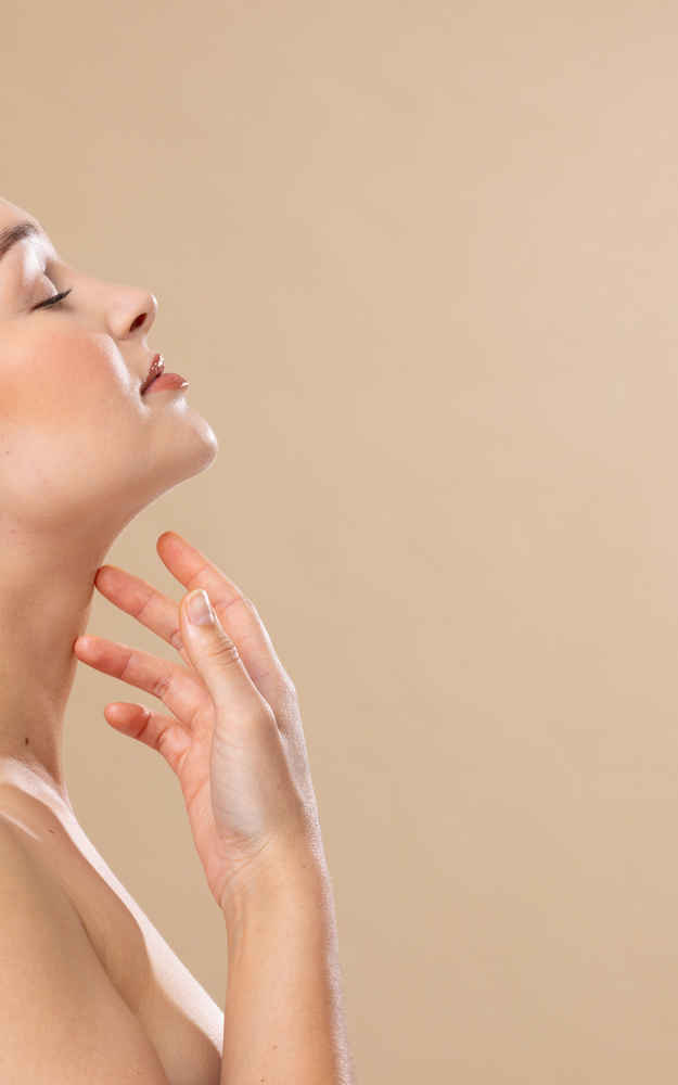 Side view of woman after liposuction surgery under the chin